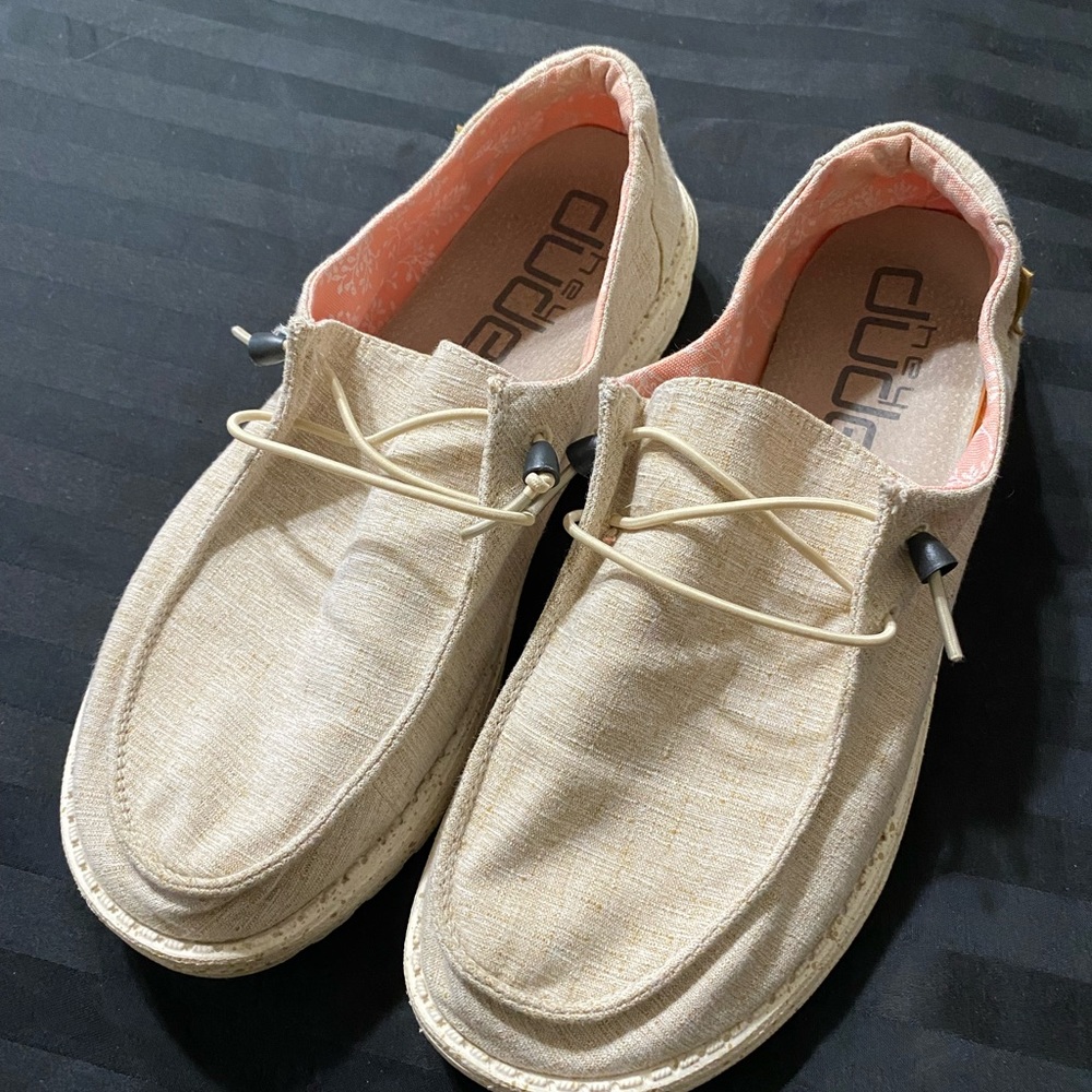 Hey Dude’s women’s size 10. In great shape.  Tan with peach lining.